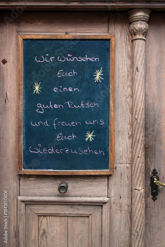 guten rutsch tafel an der tür
