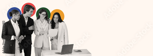 Four young professionals gather around a table in a bright office, discussing ideas while reviewing documents. They appear engaged and focused on their teamwork, showcasing collaboration.