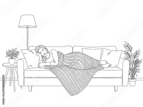 Woman relaxing on sofa while sleeping under a knitted blanket  