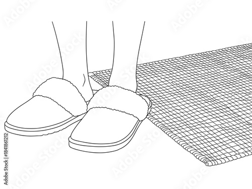 Person wearing slippers standing on a textured mat indoors  