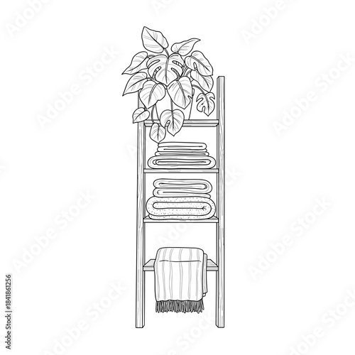 Towel rack with neatly folded towels and potted plant on top  