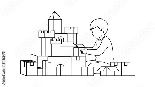 A child silhouetted against a detailed castle structure made of building blocks playing
