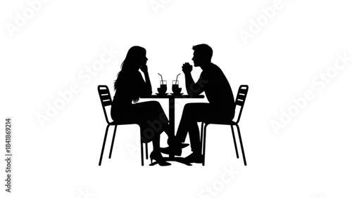 Cafe silhouette : a silhouettes couple in love is immersed in a moment of tender conversation at a cafe table, drinking a refreshment.