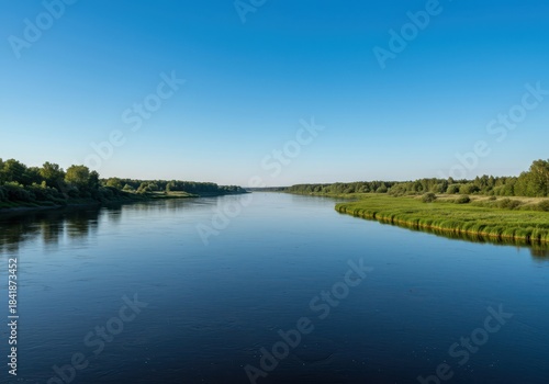 Stunning panoramic landscape showing the tranquil meeting of a flowing river with the vast, calm surface of a freshwater lake under blue skies ,environment ,peaceful ,scenic