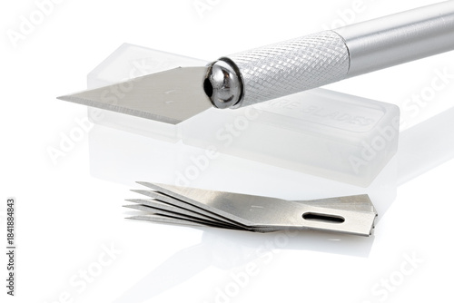 Wallpaper Mural Aluminum stationery knife isolated on white background. Close-up Torontodigital.ca