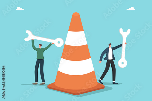 Technical support and optimization of work processes, assistance in correcting unforeseen circumstances, teamwork to solve complex situations and problems, men with wrenches near a traffic cone.