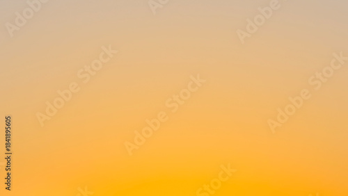 Yellow golden sky pastel with fluffy cloud. Summer sunset nature landscape. Beautiful sunrise background. Cloudscape gradient abstract.
