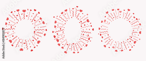 Circular confetti patterns made of small red hearts arranged in decorative rings.