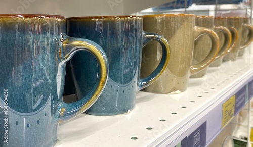 Cups mugs in the store shop supermarket photo