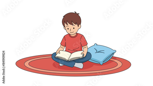 A young boy sits cross-legged on a rug, engrossed in reading a book, with a pillow beside him.