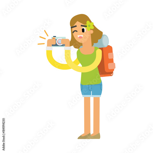 Female tourist photographer taking a picture with a digital camera