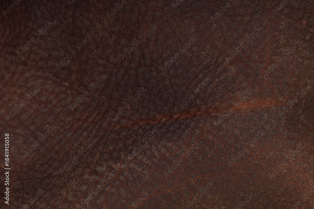 Fototapeta premium Dark brown old worn leather texture