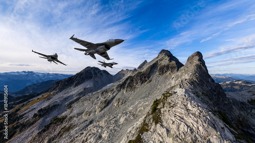 Quadro em tela Fighter Jets Over Jagged Alpine Peaks In Dramatic Mountain Range With Clear Sky