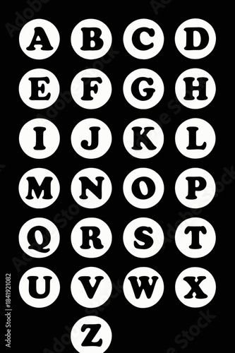 Alphabet Letters A to Z in White Circles on Black Background - Visual Representation of the English Alphabet