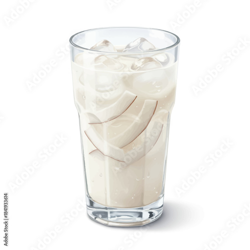 A tall glass of iced milky coconut drink garnished with coconut shavings