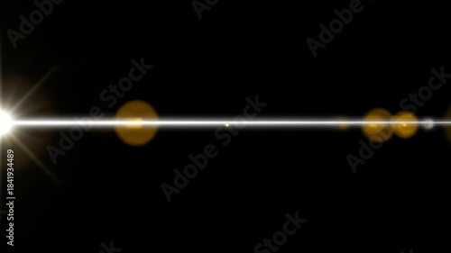 Bright light ray with lens flares, straight on a black background