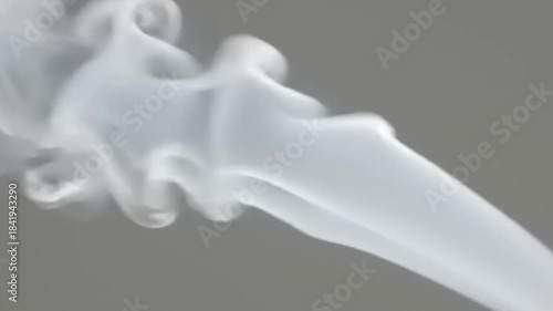 Abstract white smoke against grey background.