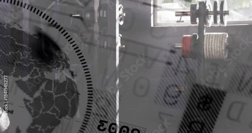 Overlay drifting, starting camera pan, globe and dial sweeping in, revealing weight rack and plates