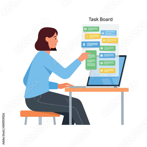 Woman working on computer with task board