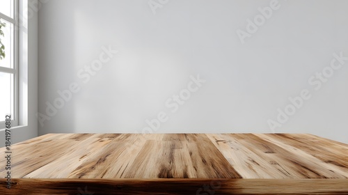 Wooden surface provides foreground display area against a bright, neutral wall background