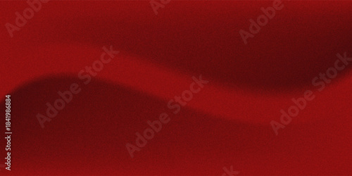 premium dark Red Background texture for Design. Vibrant red gradient background with textured grain and luminous glow effect. Dark candy apple red gradient