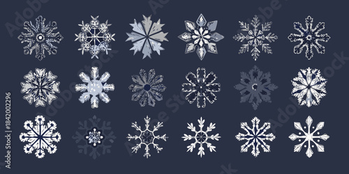 An assortment of intricately designed pale blue and white snowflakes