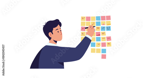 Man Marking Tasks with Pen on Colorful Sticky Notes