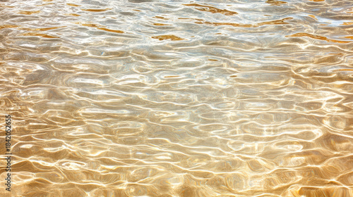 Warm glimmering reflections blank center region serene golden water shimmer
