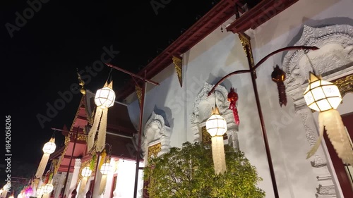 Walking around Wat Chedi Luang Buddhist temple at night in Chiang Mai, Thailand