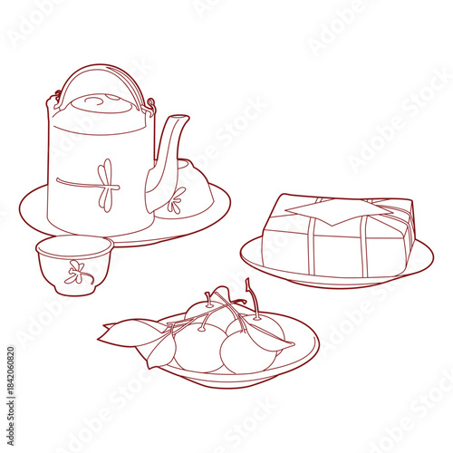 A tea set with a teapot, teacup, banh chung cake - vietnam lunar new year