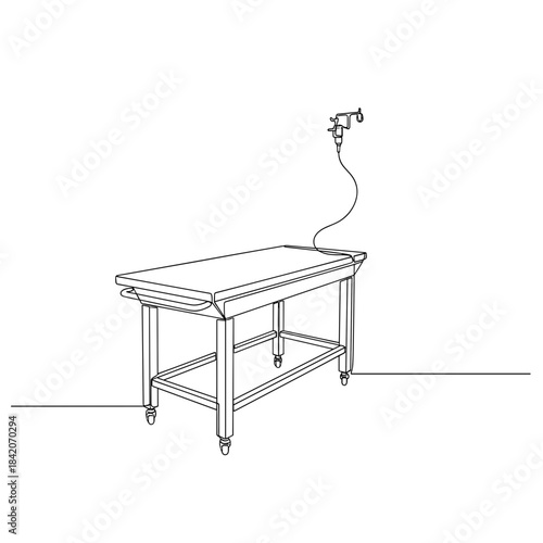 Autopsy table with attached instruments in clinical setting  