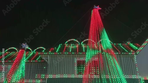 Christmas holiday outdoor lights, festive light show at night