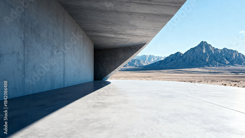 Concrete structure with vast desert and mountain view in the distance