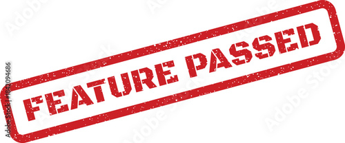Red rectangular rubber stamp mark with FEATURE PASSED text and grunge texture effect