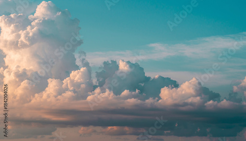 Vivid Blue Sky with Scattered White Cumulus Clouds on a Bright Sunny Day, Atmospheric Landscape Background Showing Clear Weather and Soft Cloud Formations