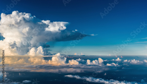 Vivid Blue Sky with Scattered White Cumulus Clouds on a Bright Sunny Day, Atmospheric Landscape Background Showing Clear Weather and Soft Cloud Formations