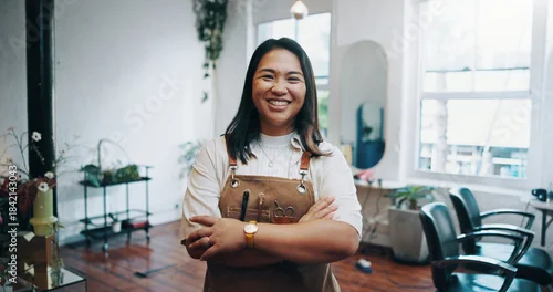 Obraz Portrait, happiness and woman in hair salon with arms crossed, about us or owner of small business. Smile, grooming and hairdresser in startup with confidence, experience or career in beauty industry