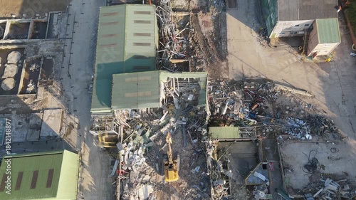 Chemical plant industrial demolition project. Decommissioning and demolition, removal and disposal of asbestos storage equipment, buildings and structural steelwork. Enviromental and global pollution