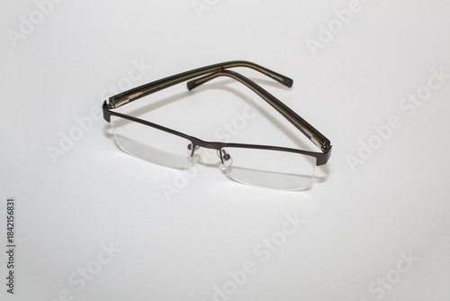 Quadro su tela Men's Eye Glasses on white surface
