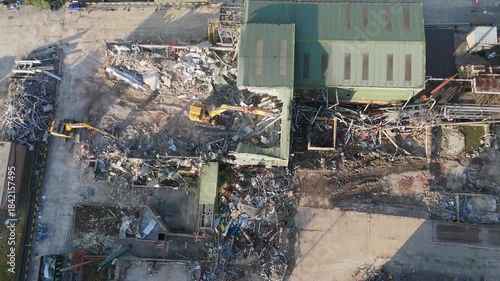 Chemical plant industrial demolition project. Decommissioning and demolition, removal and disposal of asbestos storage equipment, buildings and structural steelwork. Enviromental and global pollution