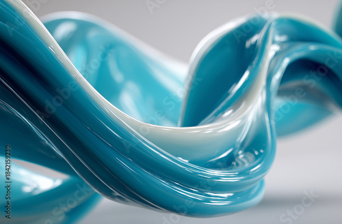 A blue and white wave with a shiny, reflective surface. The image has a dreamy, ethereal quality to it