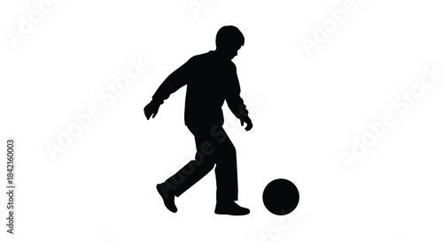 A dynamic black silhouette of a person kicking a soccer ball with energy and motion silhouette