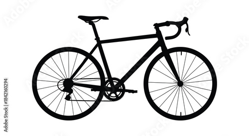 A sleek black road bicycle presented in a striking dark form capturing cycling s essence silhouette