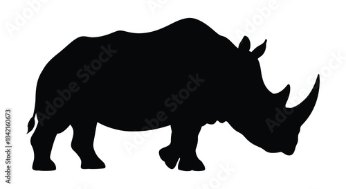 A striking black rhino side profile illustration showcasing its powerful form and unique horn silhouette