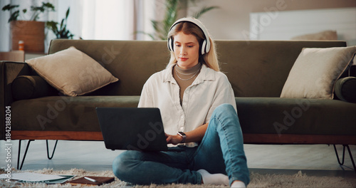 Tableau sur toile Laptop, remote work or woman with headphones in home, reading resume or screening online for hiring