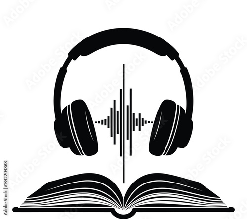 Audiobook listening with headphones and open book