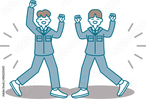 元気にガッツポーズをする作業着の男性たち