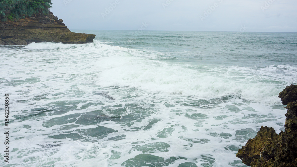 Fotografie Ngliyep Beach Landscape in Malang, East Java, Indonesia