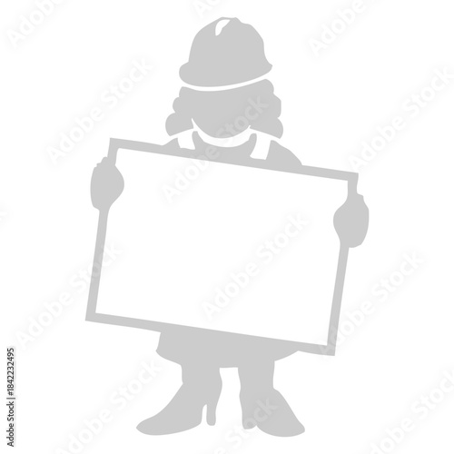 Woman in hard hat holding sign