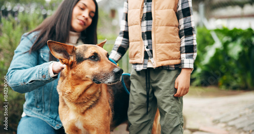 Photos Animal shelter, mom and kid with dog outdoor for adoption, foster care and bonding